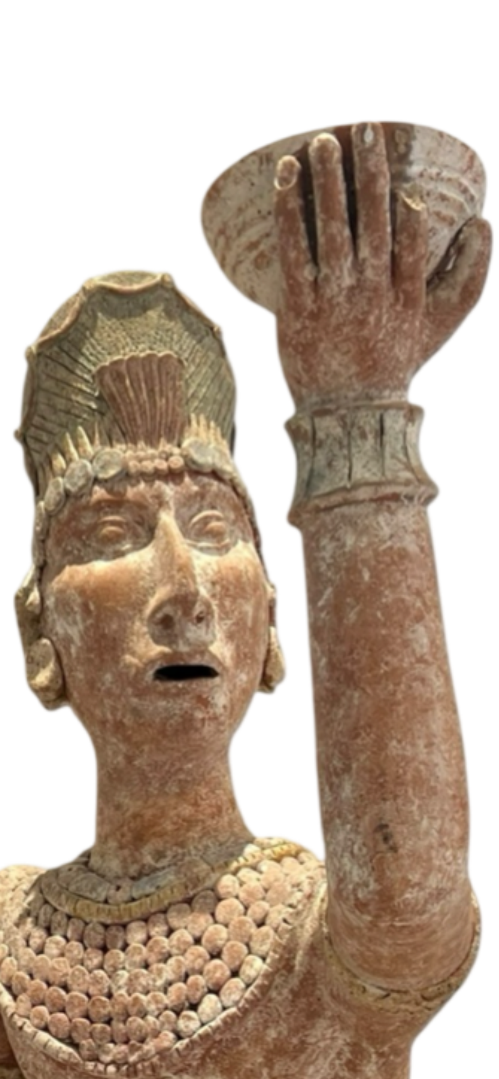 A towering guardian in terracotta