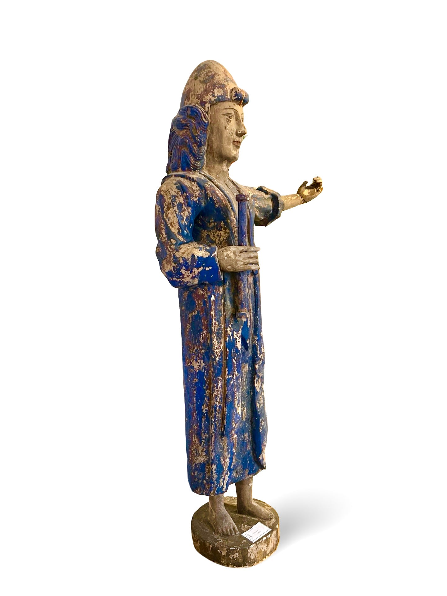 A tall and beautifully weathered Asian folk carving, late 19th–early 20th century.
